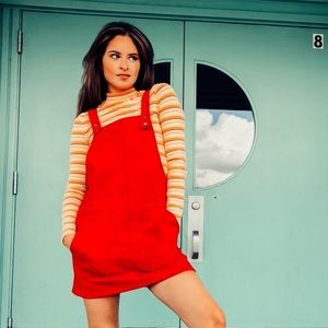 Dress with striped long sleeve shirt.